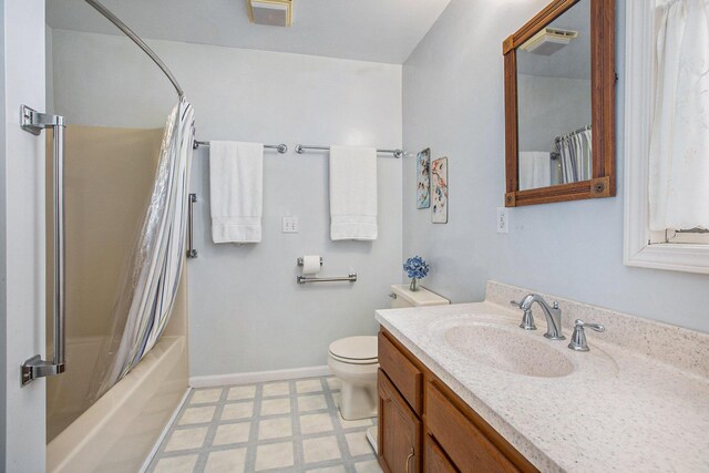 full bathroom featuring vanity, toilet, tile patterned floors, shower / bath combination with curtain, and baseboards
