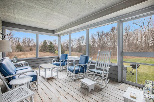 sunroom / solarium featuring a wealth of natural light