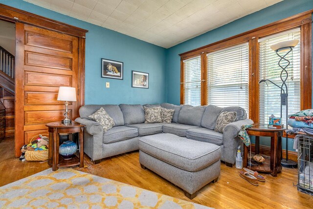 815 Wolcott Ave, Saint Joseph, MI 49085 - living area featuring wood finished floors and stairs