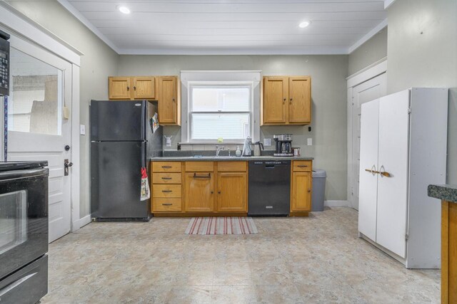 815 Wolcott Ave, Saint Joseph, MI 49085 - kitchen with black appliances, ornamental molding, recessed lighting, a sink, and baseboards