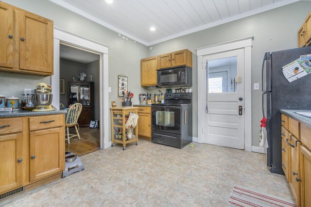 815 Wolcott Ave, Saint Joseph, MI 49085 - kitchen with black appliances, recessed lighting, ornamental molding, wooden ceiling, and brown cabinets