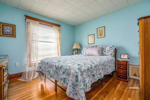 815 Wolcott Ave, Saint Joseph, MI 49085 - bedroom with hardwood / wood-style flooring and baseboards