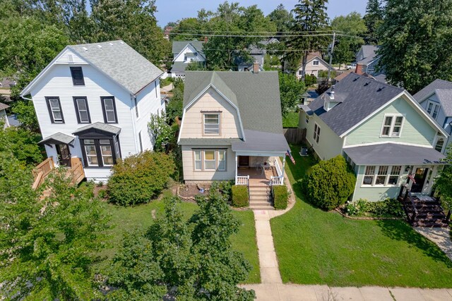 815 Wolcott Ave, Saint Joseph, MI 49085 - view of front facade featuring a porch, a front yard, and a residential view