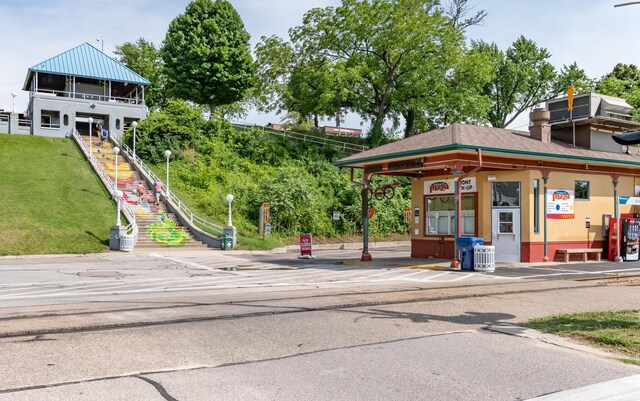 815 Wolcott Ave, Saint Joseph, MI 49085 - view of community featuring stairs and a lawn