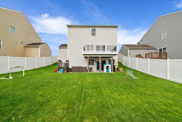 5922 Sable Ridge Dr SE, Kentwood, MI 49508 - back of house with a wooden deck and an outdoor hangout area