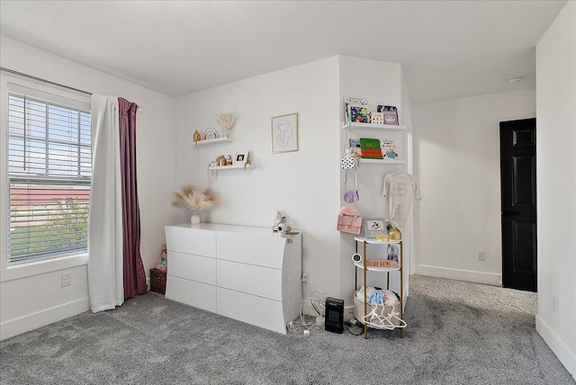 5922 Sable Ridge Dr SE, Kentwood, MI 49508 - carpeted bedroom featuring multiple windows and baseboards