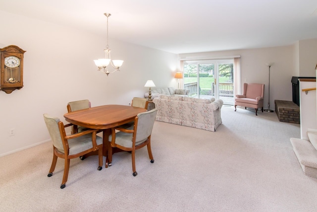 2033 Pauline Ct, Ann Arbor, MI 48103 - dining room with carpet floors and a notable chandelier