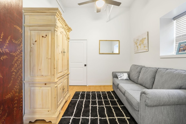 532 Dyckman Ave Unit B1A, South Haven, MI 49090 - living area with light wood finished floors, ceiling fan, and baseboards