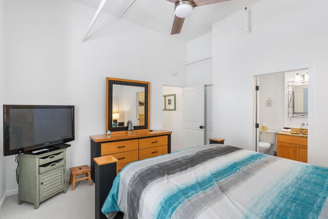 532 Dyckman Ave Unit B1A, South Haven, MI 49090 - bedroom featuring a sink, light colored carpet, a high ceiling, ensuite bathroom, and ceiling fan