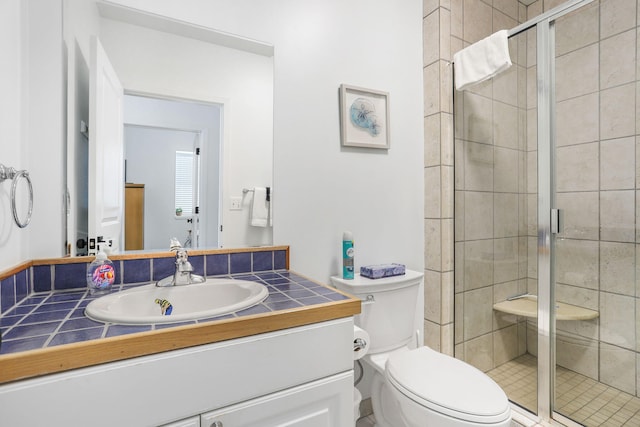 532 Dyckman Ave Unit B1A, South Haven, MI 49090 - full bathroom featuring a stall shower, toilet, and vanity