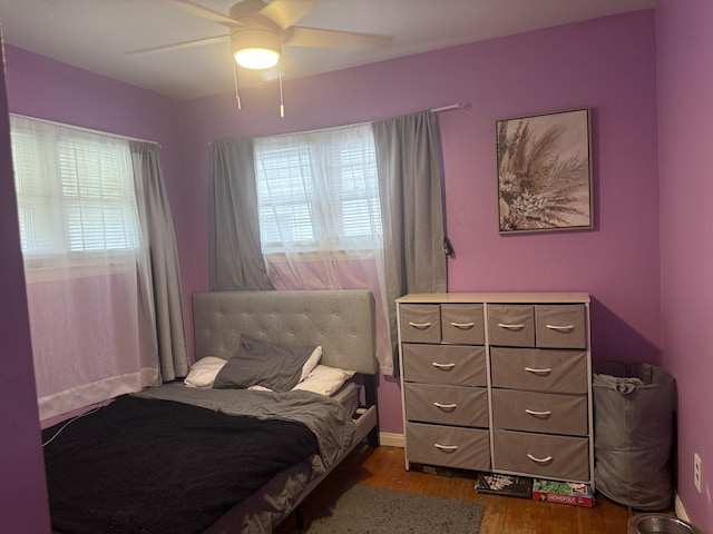 9705 Wormer Ave, Redford, MI 48239 - bedroom with ceiling fan, dark wood-style floors, and multiple windows