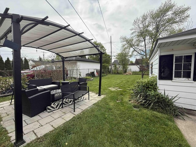 9705 Wormer Ave, Redford, MI 48239 - view of yard featuring a patio, fence, a pergola, and an outdoor hangout area