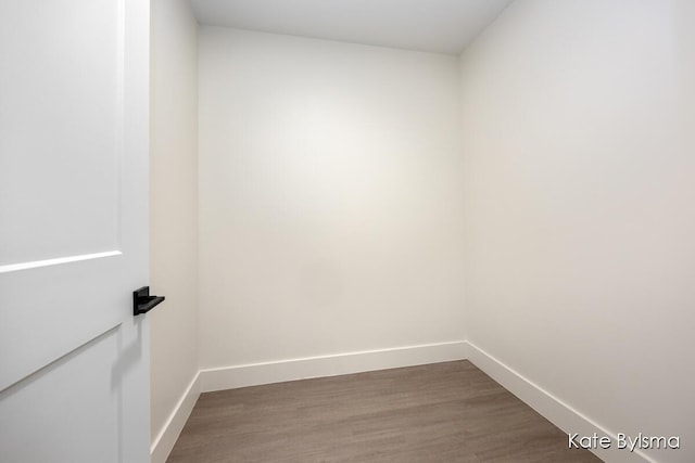 144 Oakes St SW Unit 1905, Grand Rapids, MI 49503 - unfurnished room with baseboards and wood finished floors