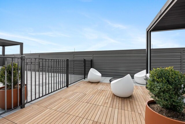 144 Oakes St SW Unit 1905, Grand Rapids, MI 49503 - view of wooden deck