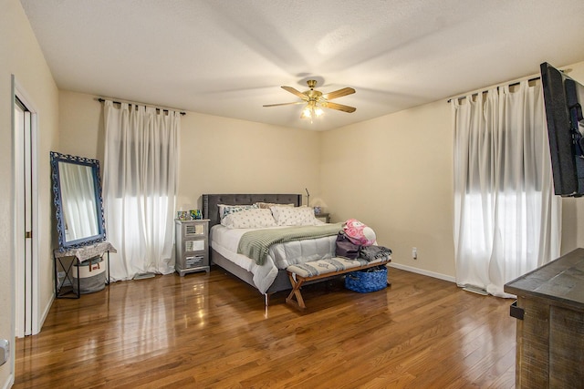 6847 Northstar Ave, Kalamazoo, MI 49009 - bedroom featuring wood finished floors, baseboards, and ceiling fan