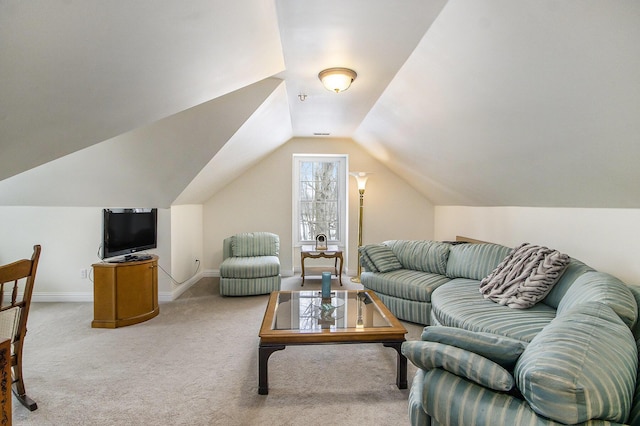 6847 Northstar Ave, Kalamazoo, MI 49009 - living area with light colored carpet, baseboards, and vaulted ceiling