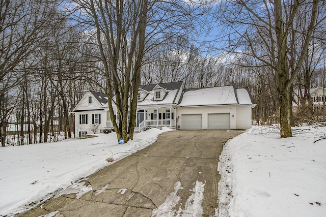 6847 Northstar Ave, Kalamazoo, MI 49009 - view of front of property featuring a porch, a garage, and driveway