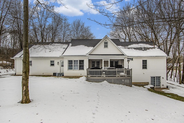 6847 Northstar Ave, Kalamazoo, MI 49009 - snow covered rear of property with a porch