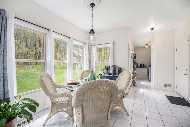 6847 Northstar Ave, Kalamazoo, MI 49009 - dining room with light tile patterned floors and baseboards