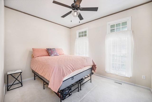6847 Northstar Ave, Kalamazoo, MI 49009 - bedroom with crown molding, baseboards, multiple windows, carpet floors, and a ceiling fan