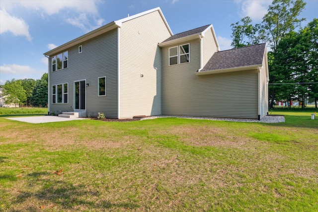 6602 E E Ave, Richland, MI 49083 - back of house featuring a patio area, a lawn, entry steps, and a shingled roof