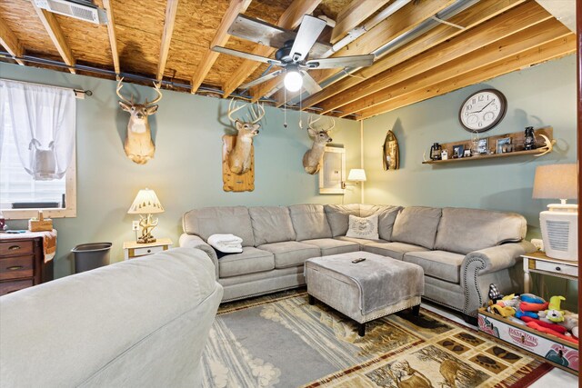 1366 Grow Rd NW, Stanton, MI 48888 - living room featuring a ceiling fan