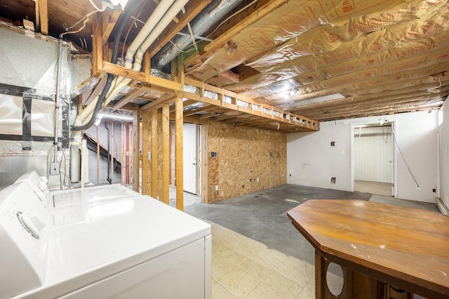 3742 School St, Bridgman, MI 49106 - unfinished basement featuring washer and clothes dryer