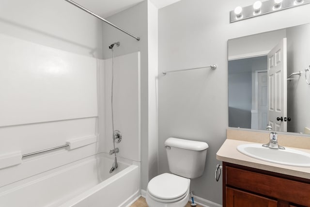 full bathroom featuring shower / washtub combination, vanity, toilet, and baseboards