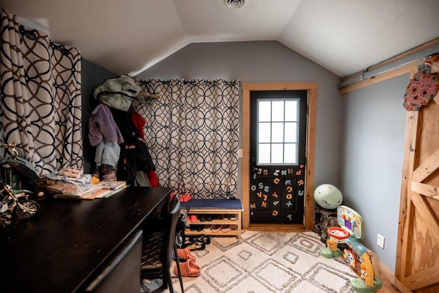 interior space with vaulted ceiling