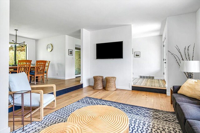 5407 Browntown Rd, Sawyer, MI 49125 - living room with wood-type flooring and baseboards