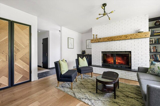 5407 Browntown Rd, Sawyer, MI 49125 - living room featuring wood finished floors and a fireplace