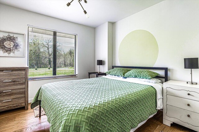 5407 Browntown Rd, Sawyer, MI 49125 - bedroom featuring wood finished floors and baseboards