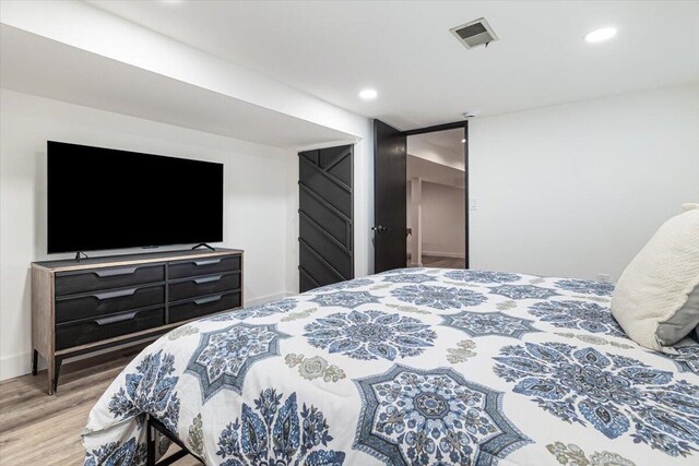 5407 Browntown Rd, Sawyer, MI 49125 - bedroom with wood finished floors and recessed lighting