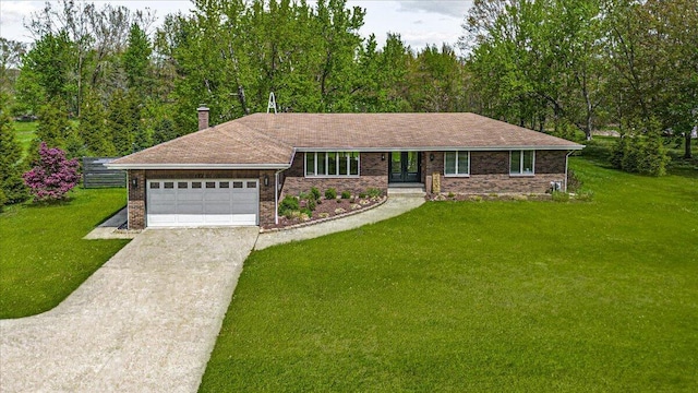 5407 Browntown Rd, Sawyer, MI 49125 - single story home featuring french doors, a garage, a front lawn, concrete driveway, and a chimney