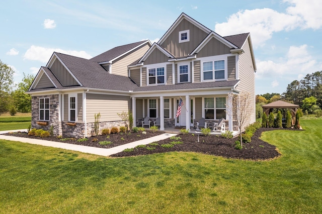 3120 Gecko Trl, Pinckney, MI 48169 - craftsman-style house featuring board and batten siding, a gazebo, stone siding, and covered porch