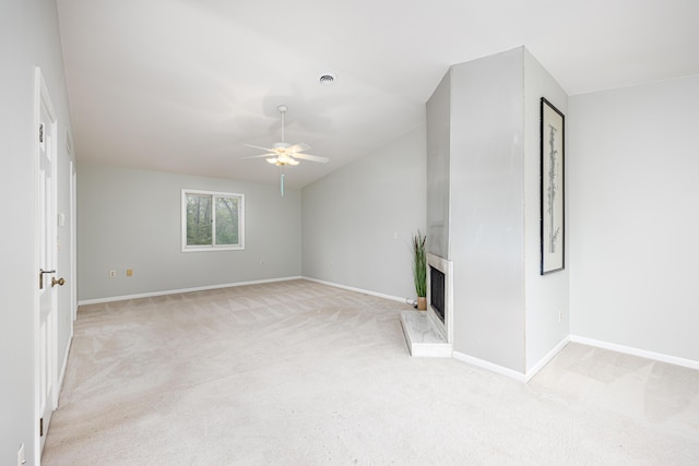 3949 Waldenwood Dr, Ann Arbor, MI 48105 - unfurnished living room with light carpet, ceiling fan, and a fireplace with raised hearth