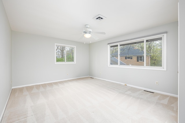 3949 Waldenwood Dr, Ann Arbor, MI 48105 - unfurnished room featuring ceiling fan, plenty of natural light, and baseboards