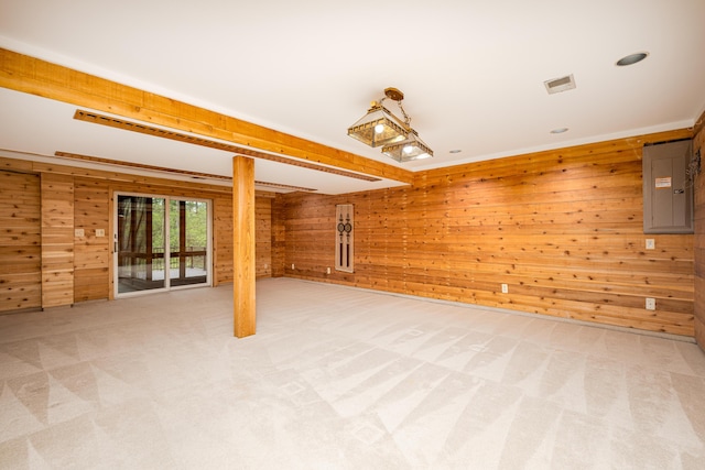 3949 Waldenwood Dr, Ann Arbor, MI 48105 - basement with wood walls, light carpet, electric panel, and recessed lighting
