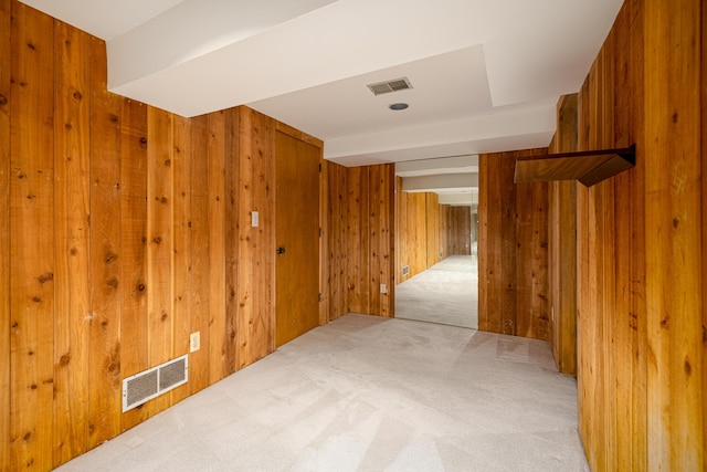 3949 Waldenwood Dr, Ann Arbor, MI 48105 - unfurnished room with wooden walls and light carpet