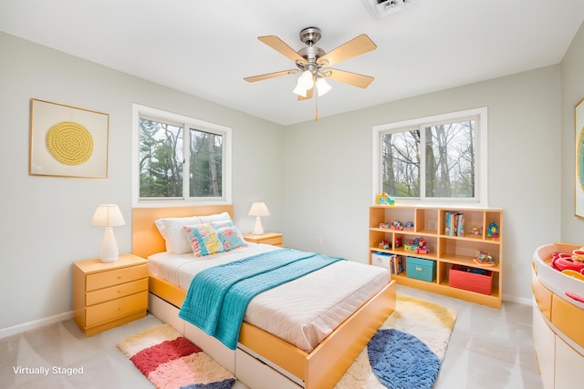 3949 Waldenwood Dr, Ann Arbor, MI 48105 - bedroom with multiple windows and baseboards