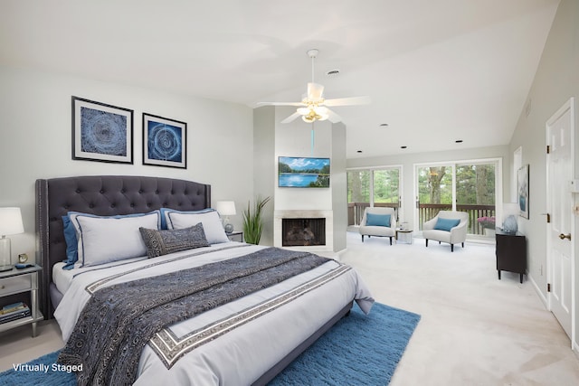 3949 Waldenwood Dr, Ann Arbor, MI 48105 - bedroom with lofted ceiling, carpet, ceiling fan, and a fireplace