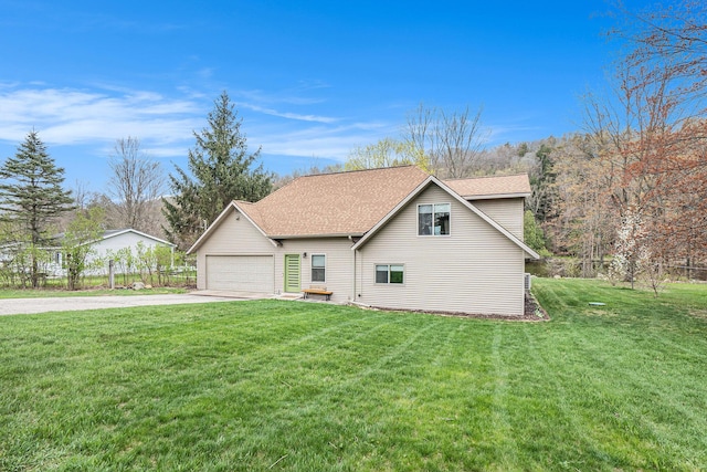 17389 Rapids Dr, Hersey, MI 49639 - traditional-style house featuring driveway, a front yard, a shingled roof, and an attached garage