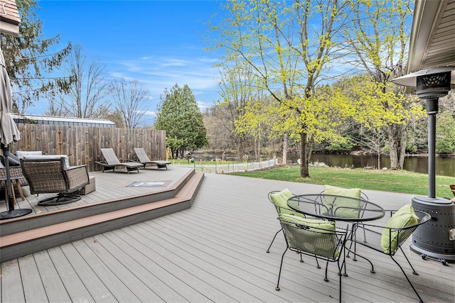 17389 Rapids Dr, Hersey, MI 49639 - wooden terrace with a water view and fence