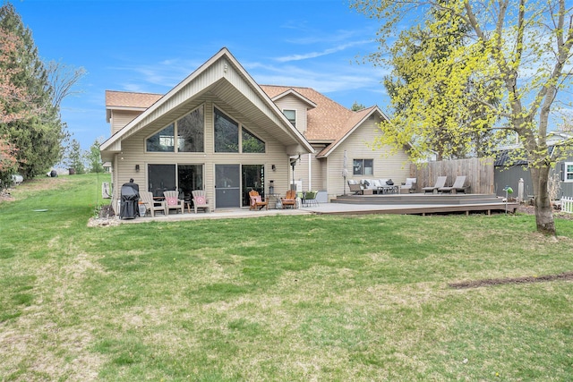 17389 Rapids Dr, Hersey, MI 49639 - rear view of house with a lawn, a deck, and a patio area