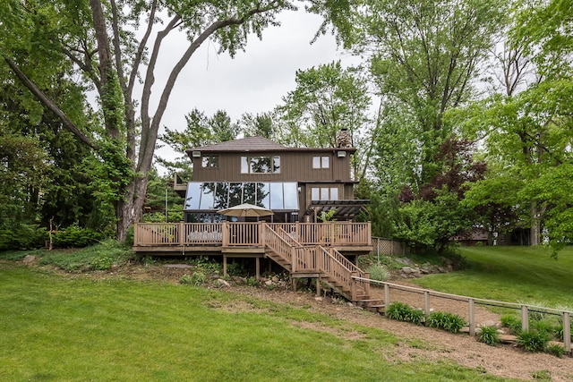 10985 E Pleasant Lake Rd, Manchester, MI 48158 - rear view of house featuring a deck, stairway, and a chimney