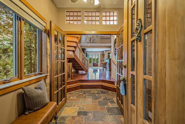 10985 E Pleasant Lake Rd, Manchester, MI 48158 - entrance foyer featuring stone tile floors and stairway