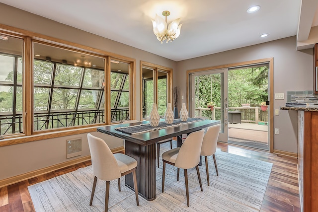 10985 E Pleasant Lake Rd, Manchester, MI 48158 - dining space featuring a chandelier, light wood-style flooring, baseboards, and recessed lighting
