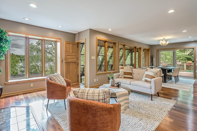 10985 E Pleasant Lake Rd, Manchester, MI 48158 - living area with recessed lighting, a chandelier, baseboards, and wood-type flooring