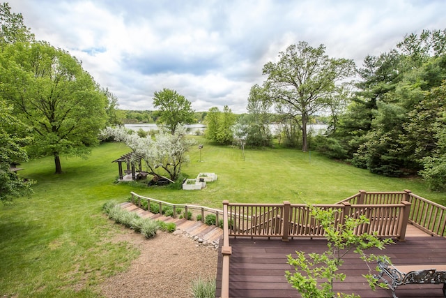 10985 E Pleasant Lake Rd, Manchester, MI 48158 - view of green lawn featuring a deck with water view