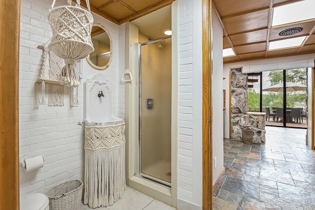 10985 E Pleasant Lake Rd, Manchester, MI 48158 - bathroom with a shower stall, stone tile flooring, and toilet